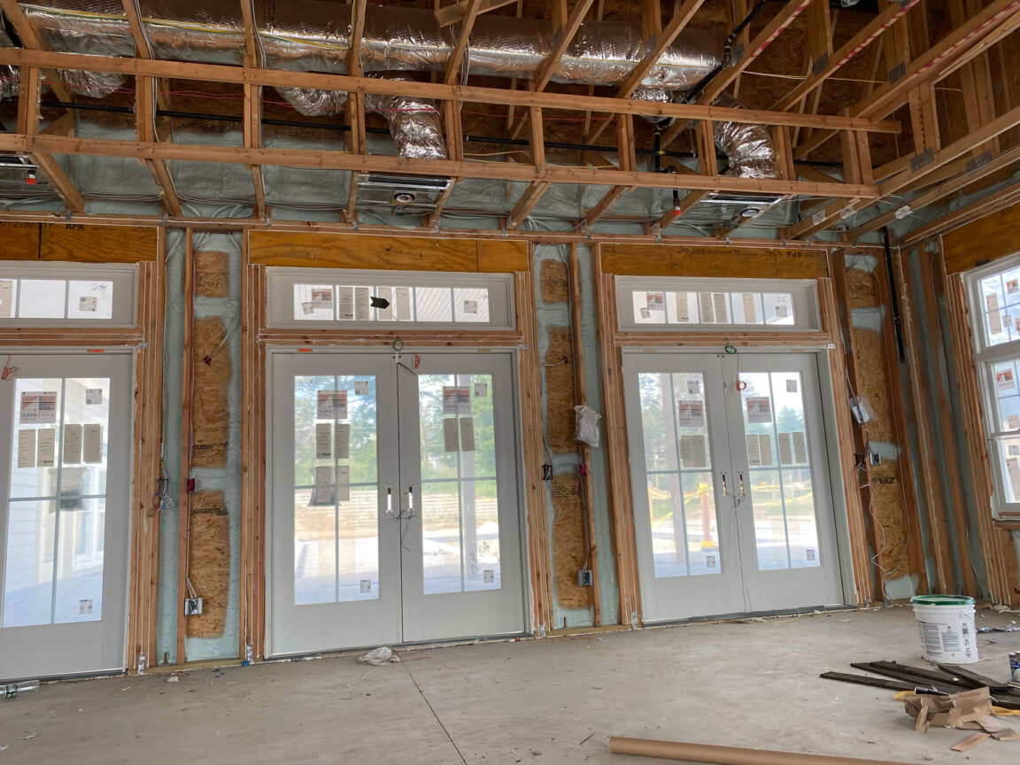 Air sealing with closed-cell spray foam during application