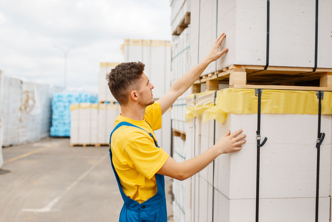 man evaluating insulation products