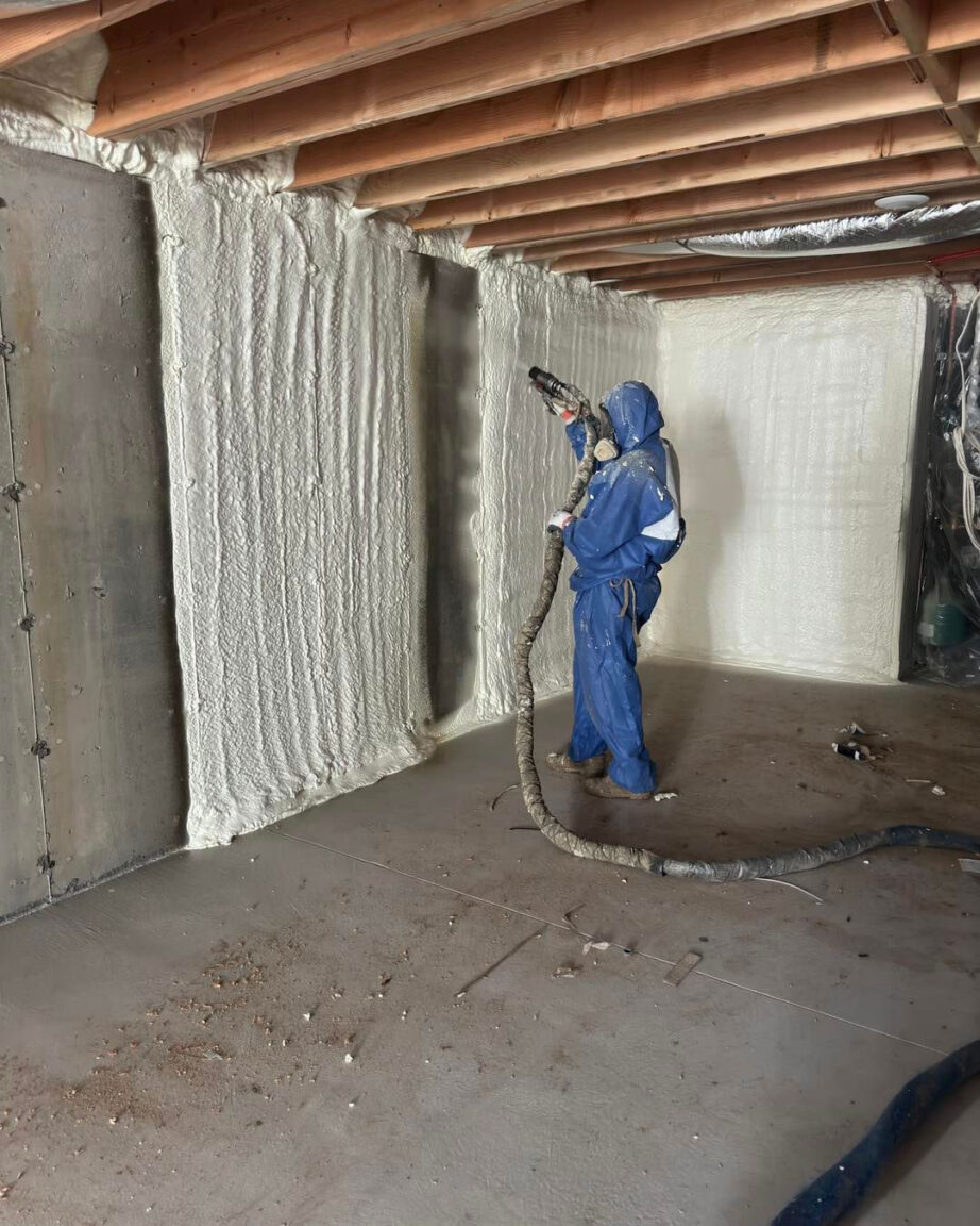 basement spray foam insulation being applied