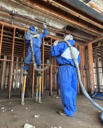 Workers Installing Insulation